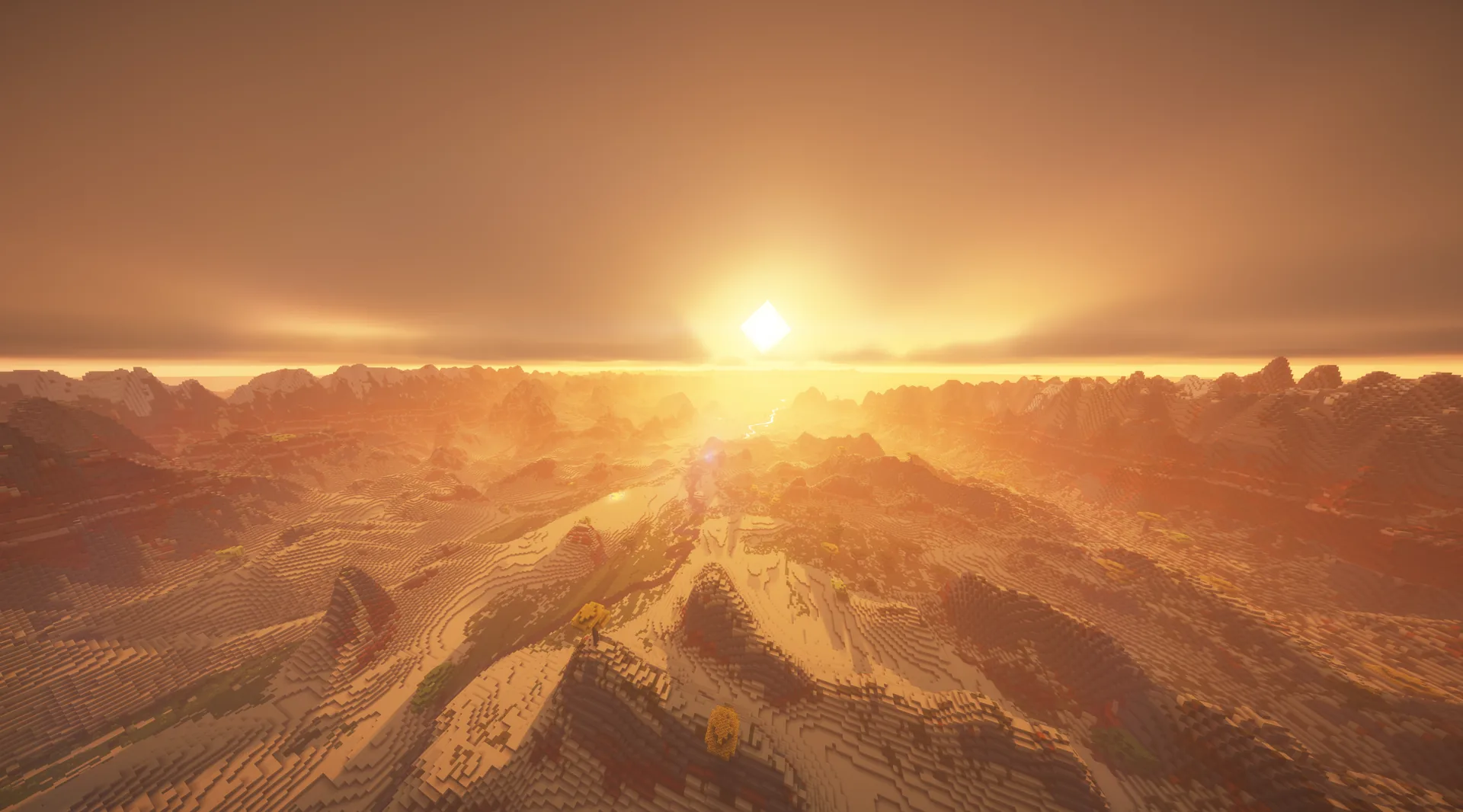 Desierto de dunas doradas al atardecer con el sol bajo en el horizonte